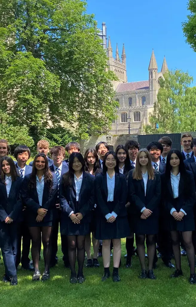 King's Ely International boarding students outside King's Ely Sixth Form 