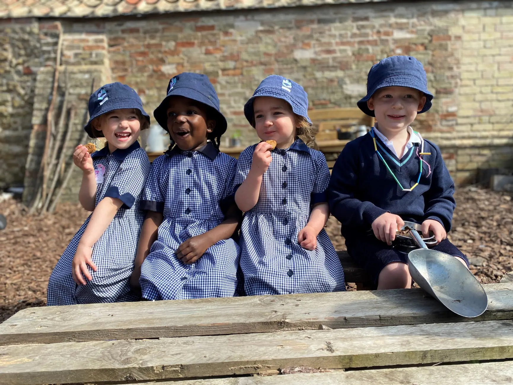 Four Pre-Prep Students at King's Ely, a Private Day Nursery and Pre-Prep near Cambridge, in Ely.