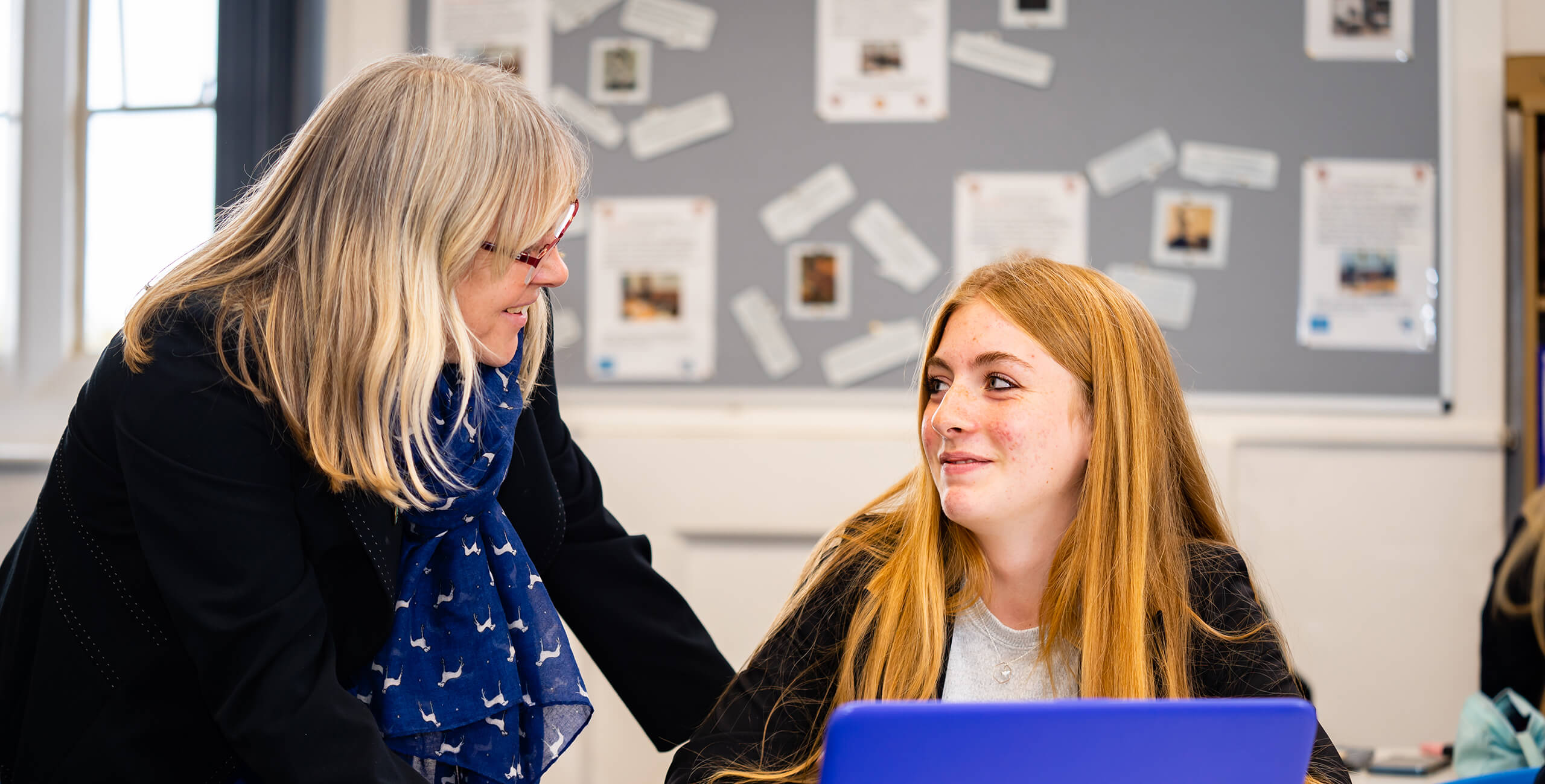 King's Ely Senior student with a member of staff. King's Ely is a private school in Cambridgeshire. 