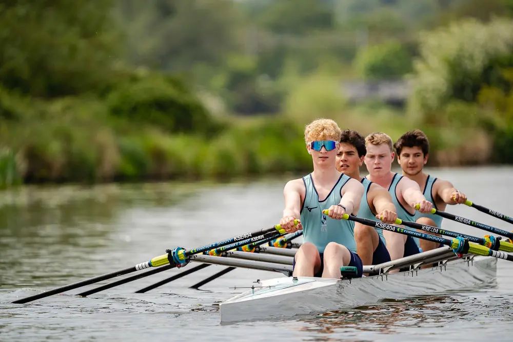 King's Ely Sixth Form rowing team rowing on the River Ouse 