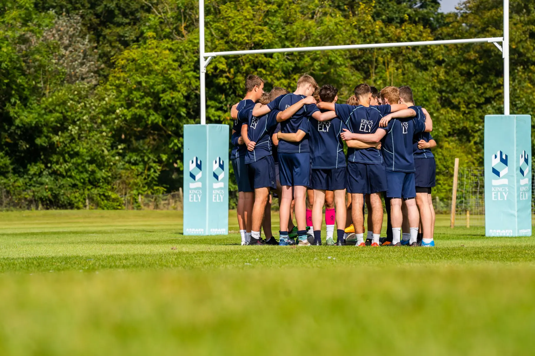 King's Ely Senior Rugby team playing a match on Brand Field 