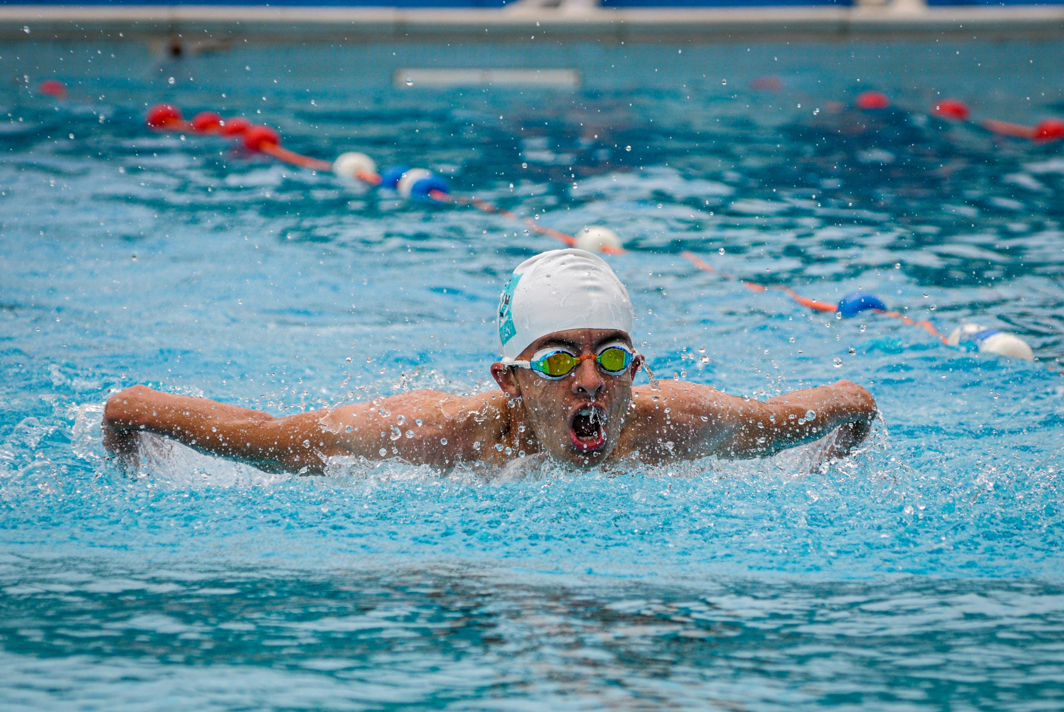 King's Ely Sixth Form student competing in a Swim Gala. King's Ely Sixth Form is a private Sixth Form based in Cambridgeshire. 