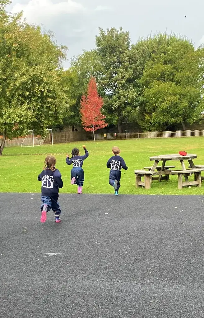 King's Ely Pre-Prep students running in the Acremont garden. King's Ely is a private school in Cambridgeshire. 